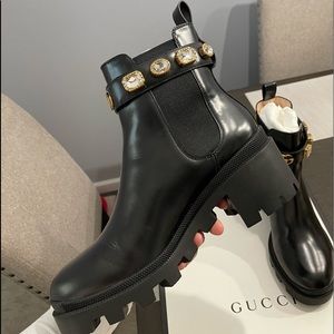 Selling brand new, never worn Gucci leather ankle boots!
